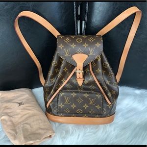 Authentic Louis Vuitton Backpack MM + Dust bag.